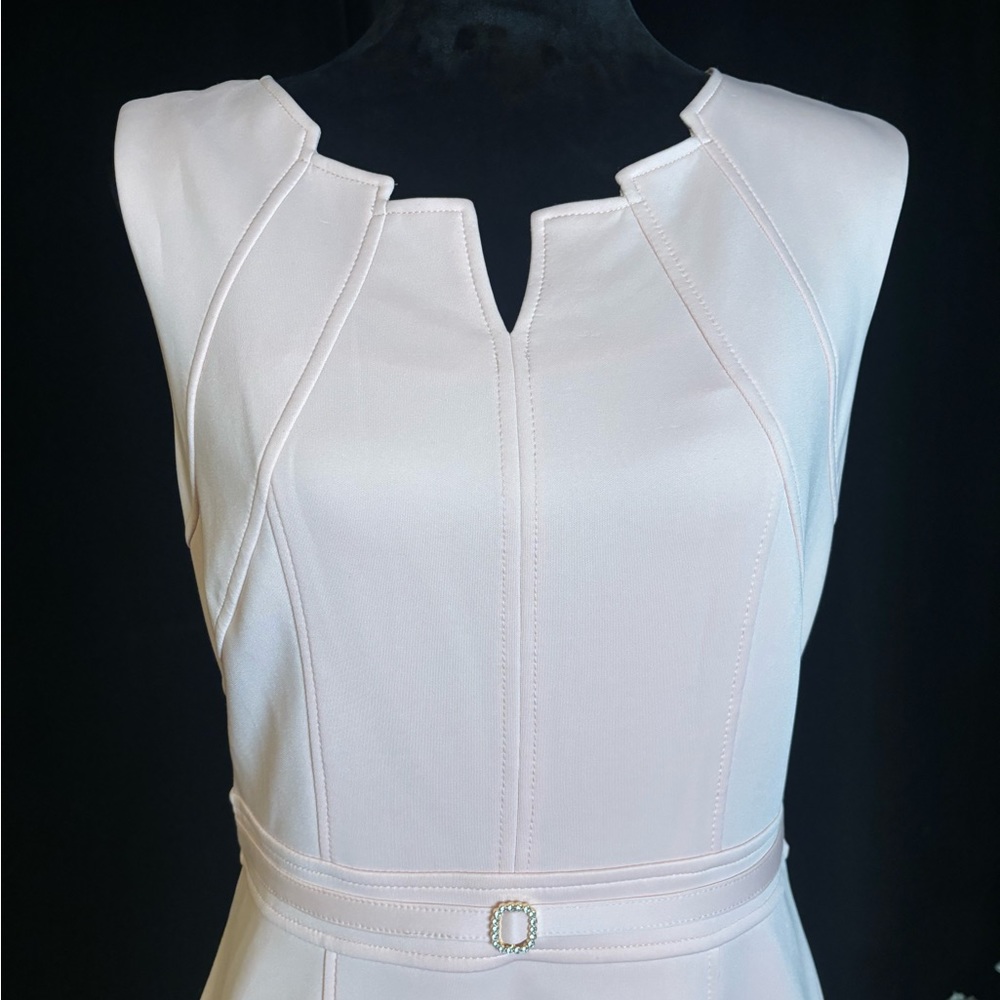Light pink sleeveless dress with V-neck